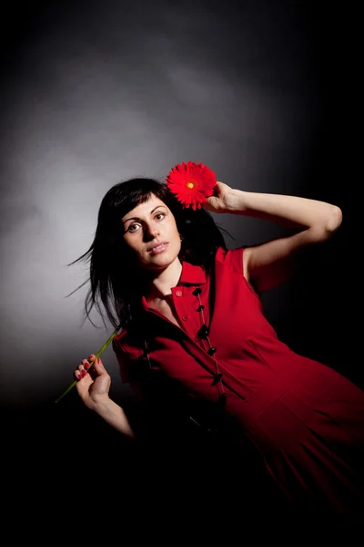 stock image Attractive woman with red flower