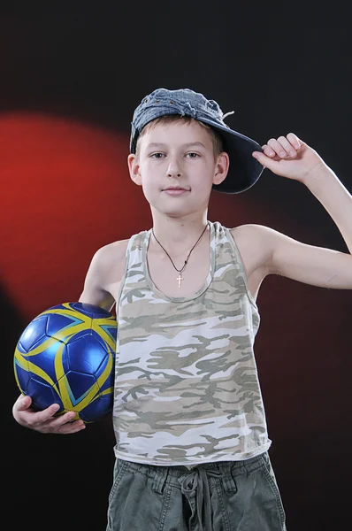 Boy of ten years with a ball — Stock Photo, Image