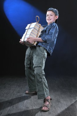 Boy and heavy books