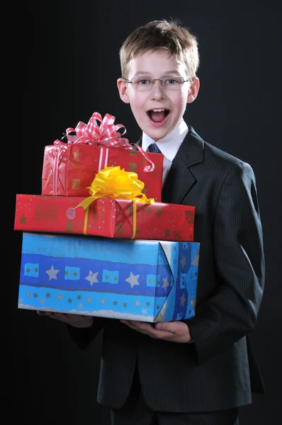 Boy with gifts — Stock Photo, Image