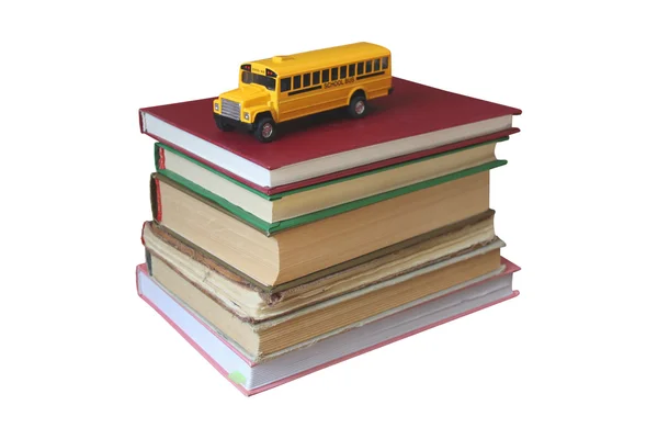Книги і жовтий автобус — стокове фото