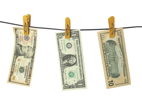 Dollars hang on clothes-peg — Stock Photo, Image