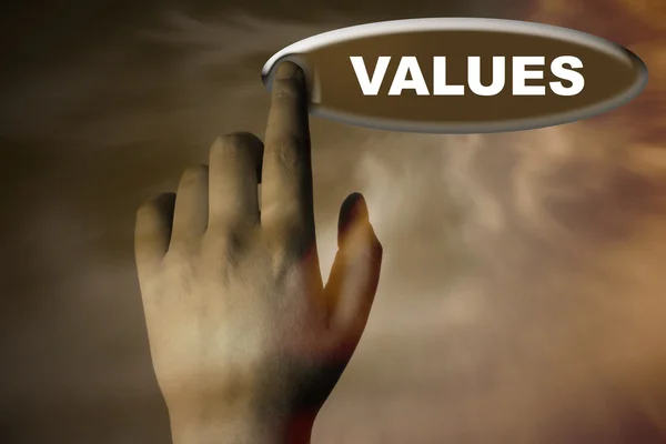 Рука і кнопка зі словом valUES — стокове фото