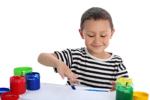 Pojke måla med hjälp hennes fingrar — Stockfoto