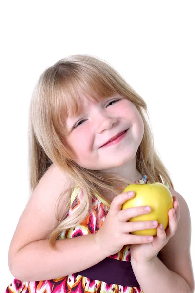 Menina pequena com maçã — Fotografia de Stock
