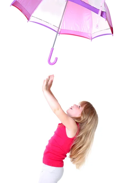 Kleines Mädchen unter fliegendem Regenschirm — Stockfoto