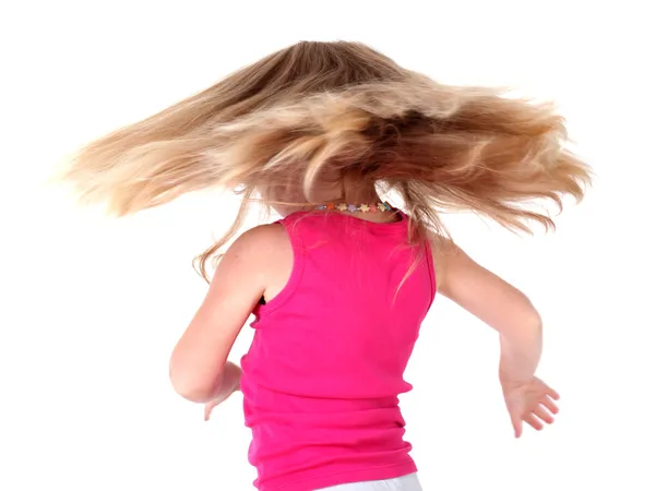 Little girl with flying hairs — Stock Photo, Image