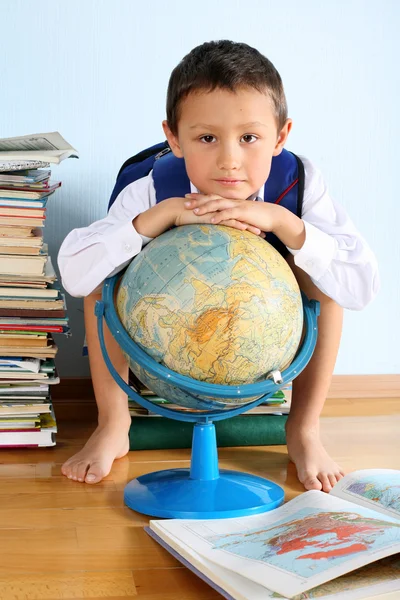 Schoolboy with globe — Stock Photo, Image