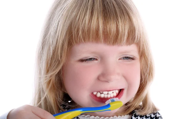 Liten flicka med tandborste — Stockfoto