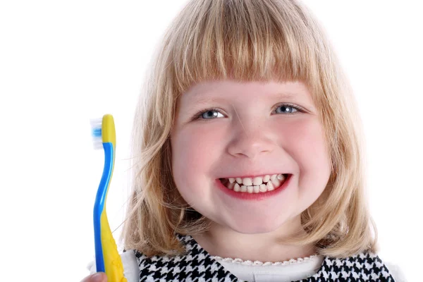 Lille pige med tandbørste - Stock-foto