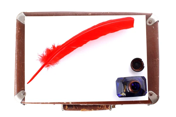 Antique red pen and inkwell at vintage page — Stock Photo, Image