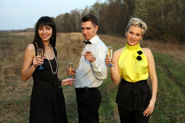 Jealousy - two girl and man with wine — Stock Photo, Image