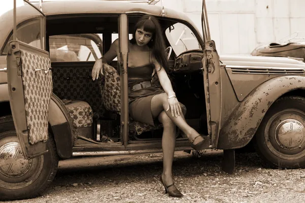 Girl inside retro car Stock Photo