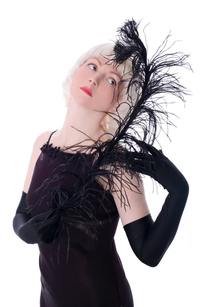 Женщина в стиле ретро с черным пером — стоковое фото