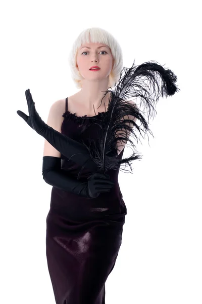 Жінка в ретро-стилі з чорним пером — стокове фото