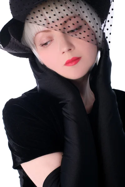Όμορφη γυναίκα με καπέλο απόκρυψη πέπλο — Φωτογραφία Αρχείου