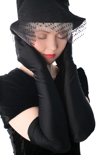 Sad woman in hat hiding at veil — Stock Photo, Image