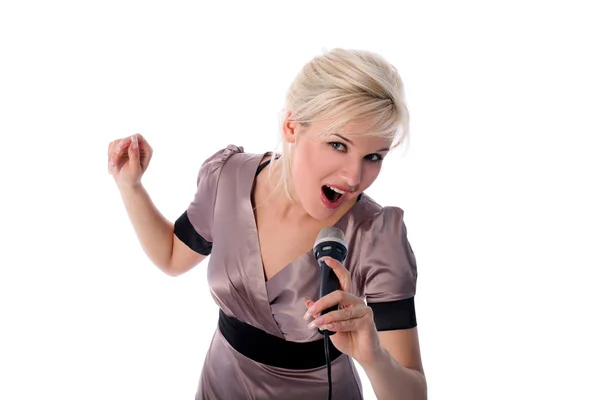 Blondine mit Mikrofon isoliert in Weiß — Stockfoto