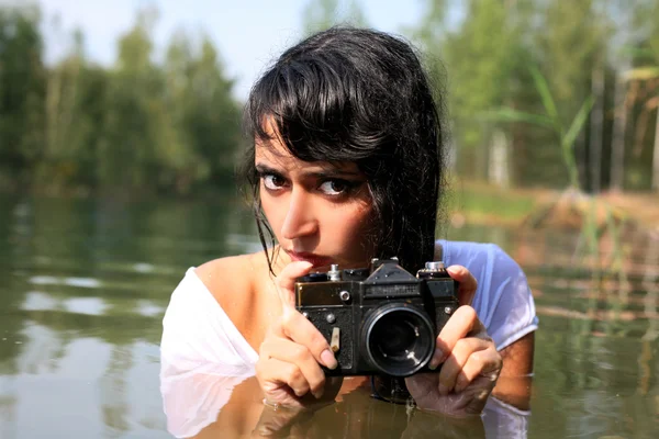 Fotograf im Wasser — Stockfoto