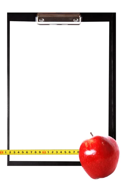 Clipboard em branco com maçã — Fotografia de Stock