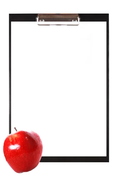 Clipboard em branco com maçã — Fotografia de Stock