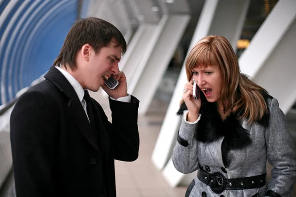 Muž a žena volání — Stock fotografie