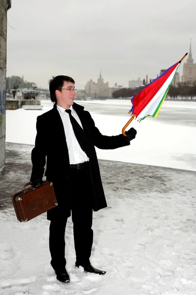 Businessman with umbrella — Stock Photo, Image
