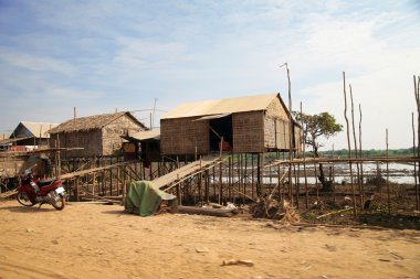 Cambodian house at Tonle Sap clipart