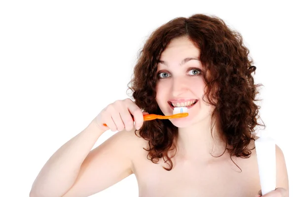 Menina com escova de dentes isolada no branco — Fotografia de Stock