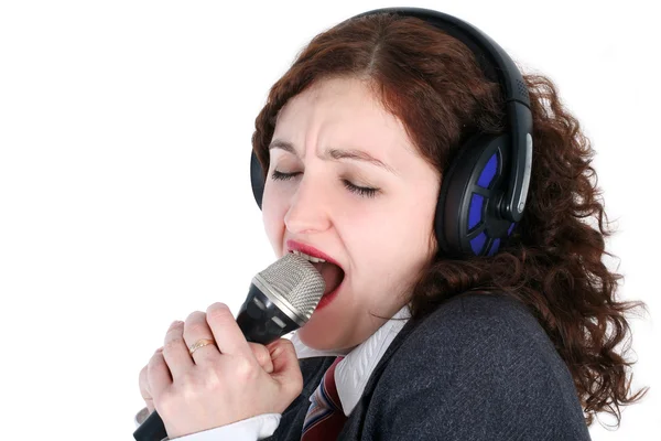 Dziewczyna śpiewa w słuchawkach — Zdjęcie stockowe