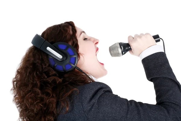 Menina cantando em fones de ouvido — Fotografia de Stock