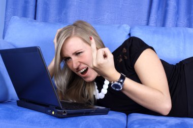 Hard day - woman working with PC clipart