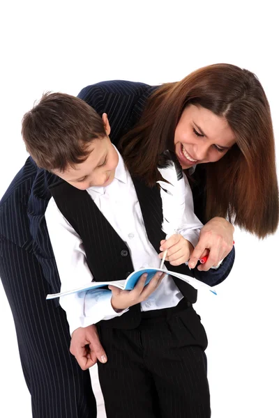 Grappige leraar of moeder en jongen met boek — Stockfoto