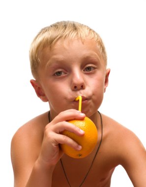 Child with an orange. clipart