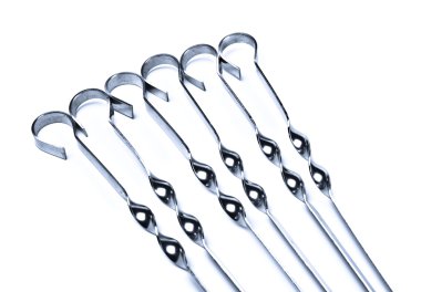 Metal skewers set closeup clipart