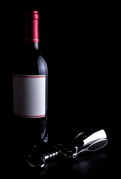 Bottiglia di vino e cavatappi — Foto Stock