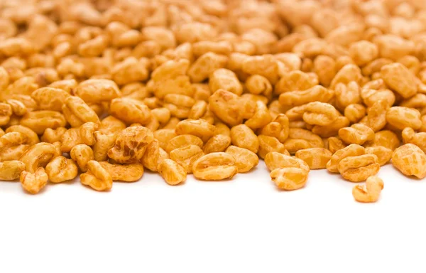 Wheat popcorn fried in honey — Stock Photo, Image