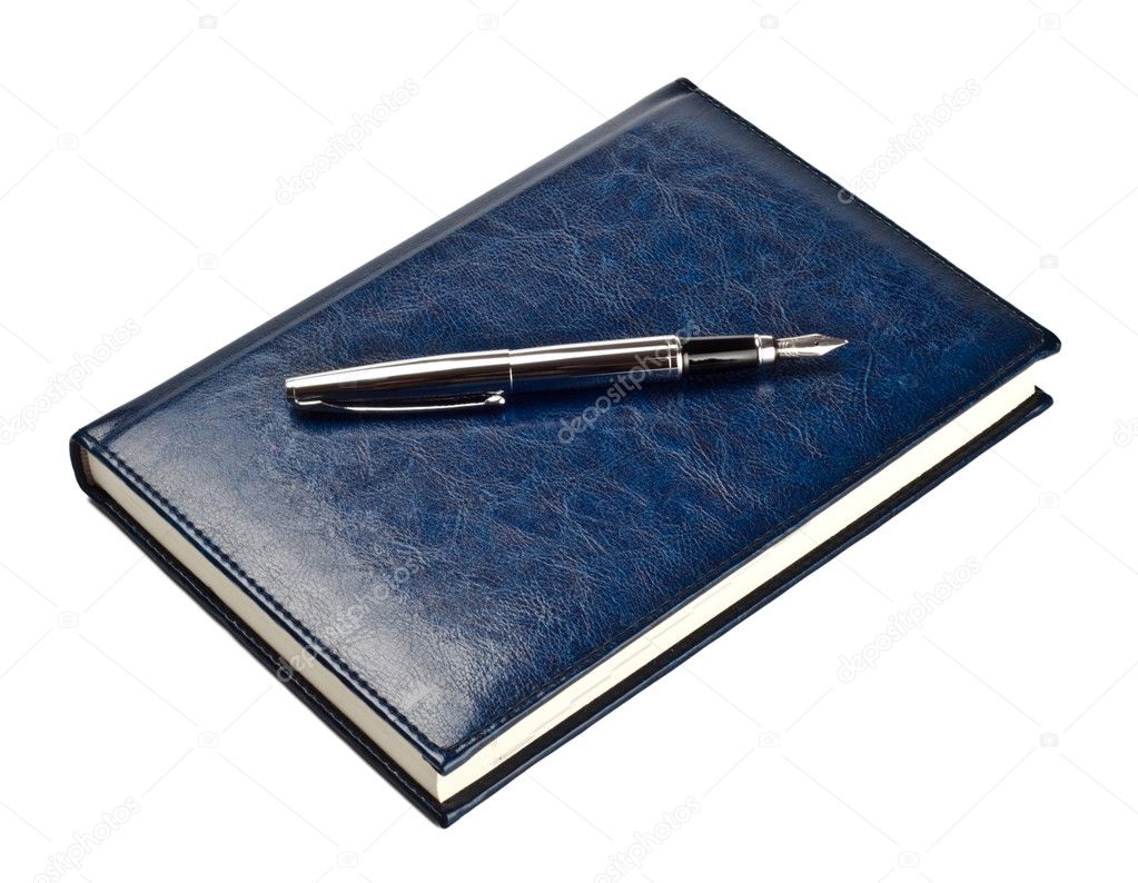 Pen on closed diary