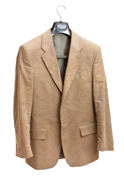 Beige jacket on hanger — Stock Photo, Image