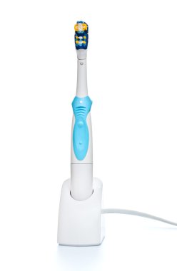 Electric toothbrush on stand clipart