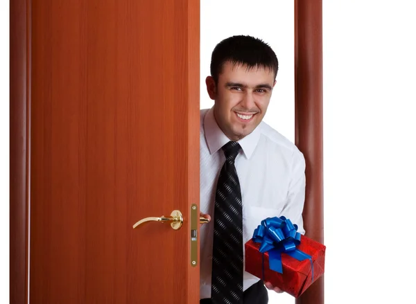 Smiling man with gift — Stock Photo, Image