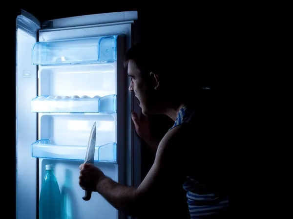 Iets verschrikkelijk verbergen in koelkast — Stockfoto