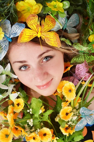 Girl with butterfly and flower — Stock Photo, Image