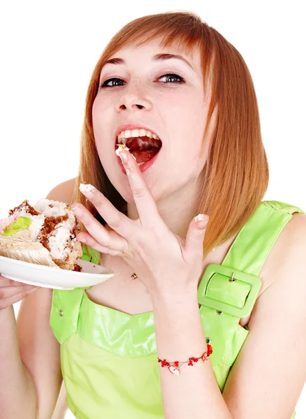 Mädchen isst Stück Kuchen. — Stockfoto