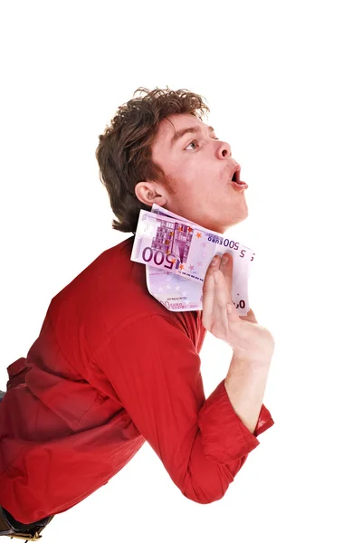 Man in rode shirt met geld euro. — Stockfoto