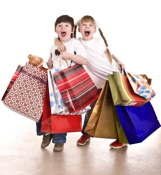 Pojke och flicka med shopping väska. — Stockfoto