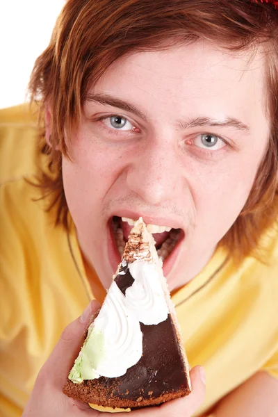 Cara del hombre comiendo pastel . — Foto de Stock