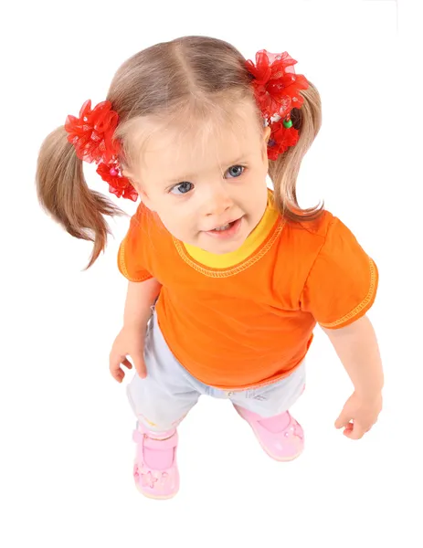 Meisje van de baby in oranje t-shirt.white achtergrond. — Stockfoto