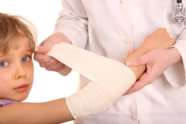 Doctor give first aid of child. — Stock Photo, Image