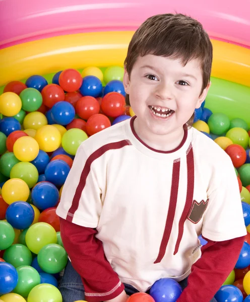 Happy birthday of fun boy in balls. — Stock Photo, Image